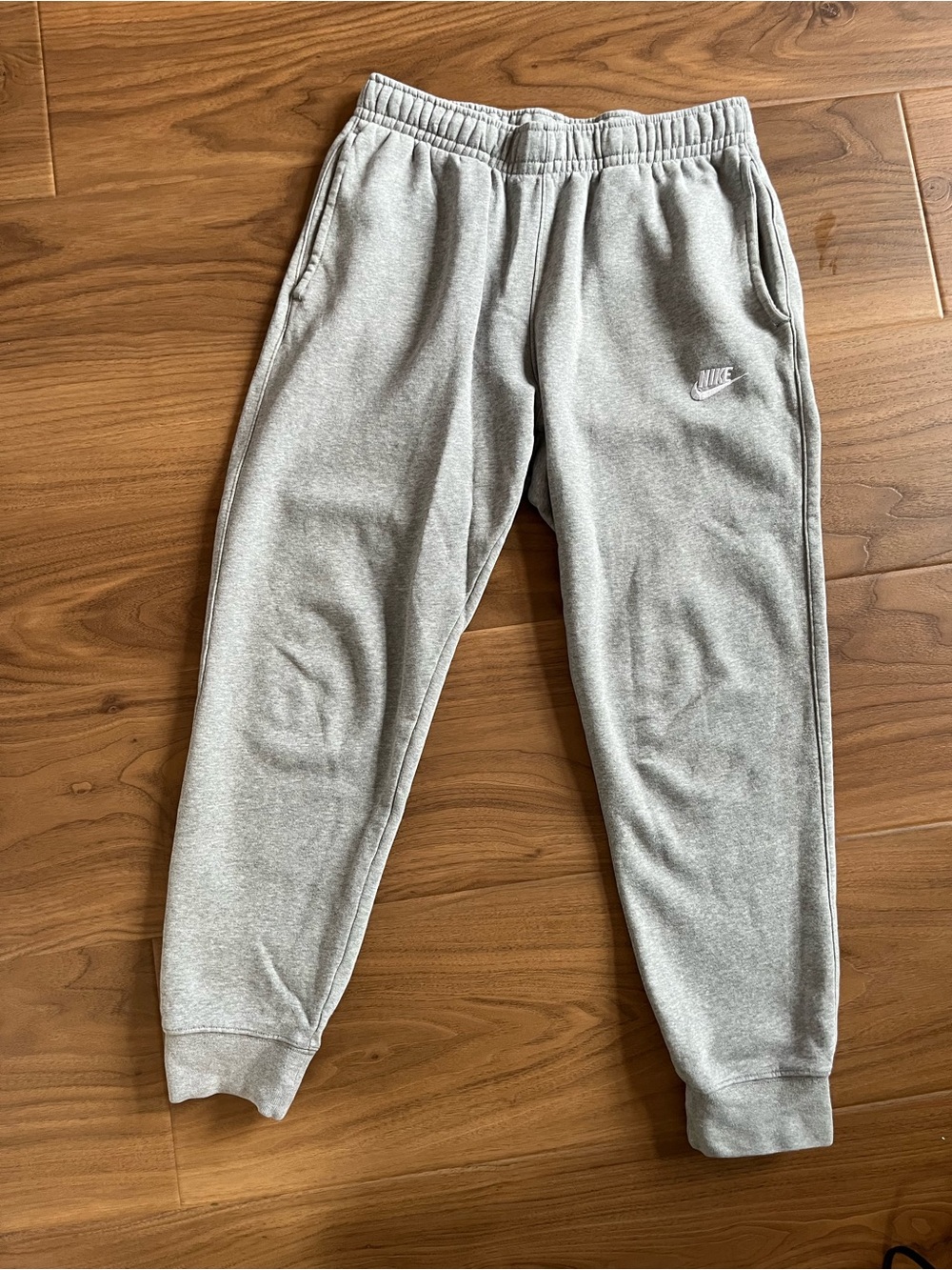 Nike Men’s Heather Gray Fleece Joggers with White Logo